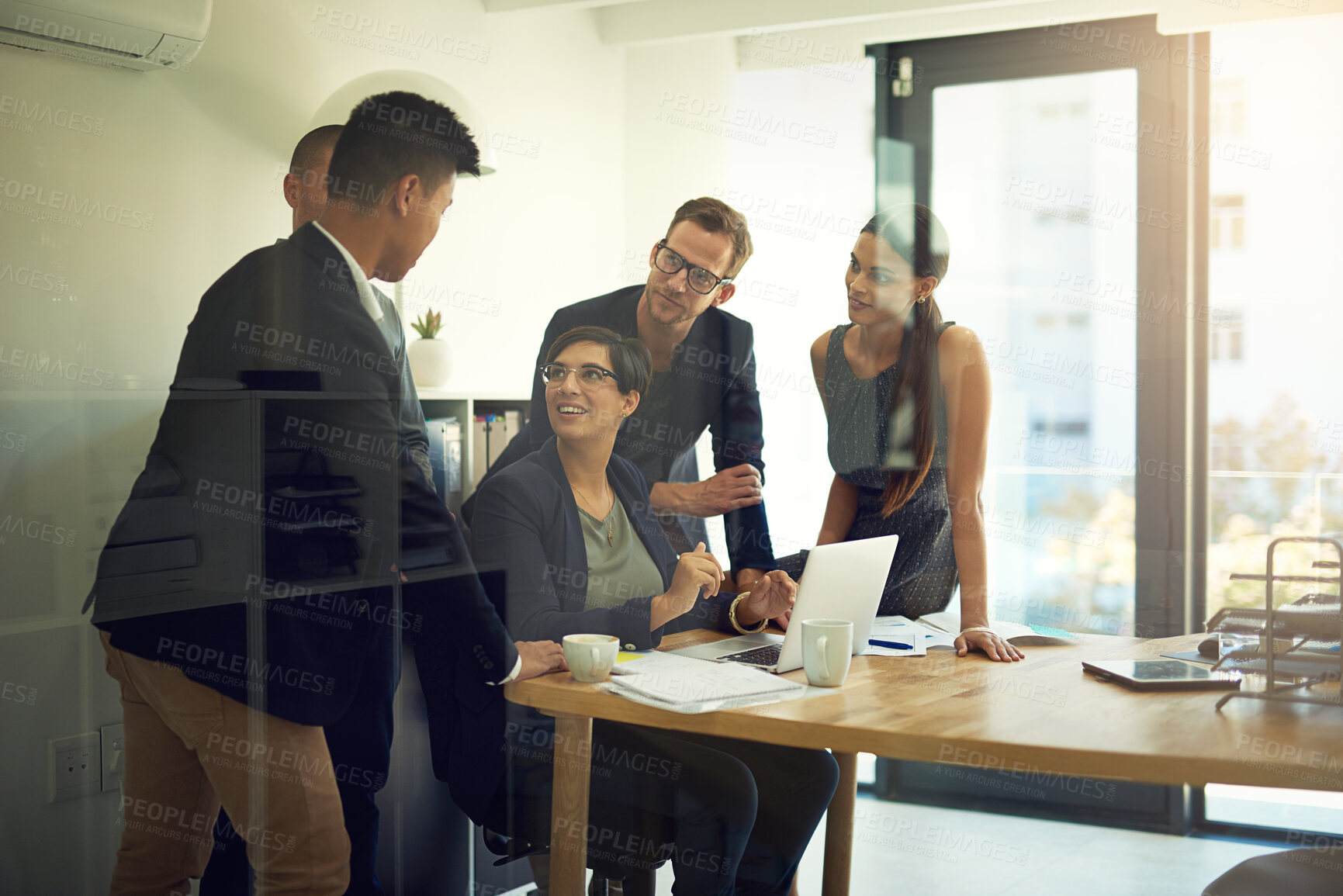 Buy stock photo Business people, laptop and partnership in office for diversity, planning and development strategy. Research, technology and collaboration for corporate training, briefing report and project review