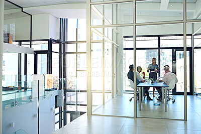 Buy stock photo Shot of a coworkers in a meeting in a modern office