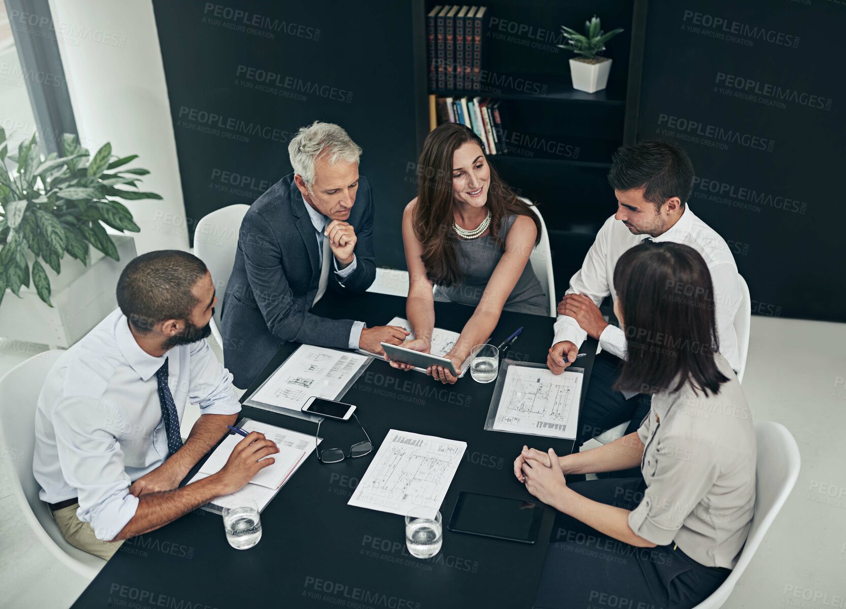 Buy stock photo Above, lawyer and business people in meeting, tablet and conversation with planning in modern office. Employees, attorney and coworkers with documents, tech and digital app with research and teamwork