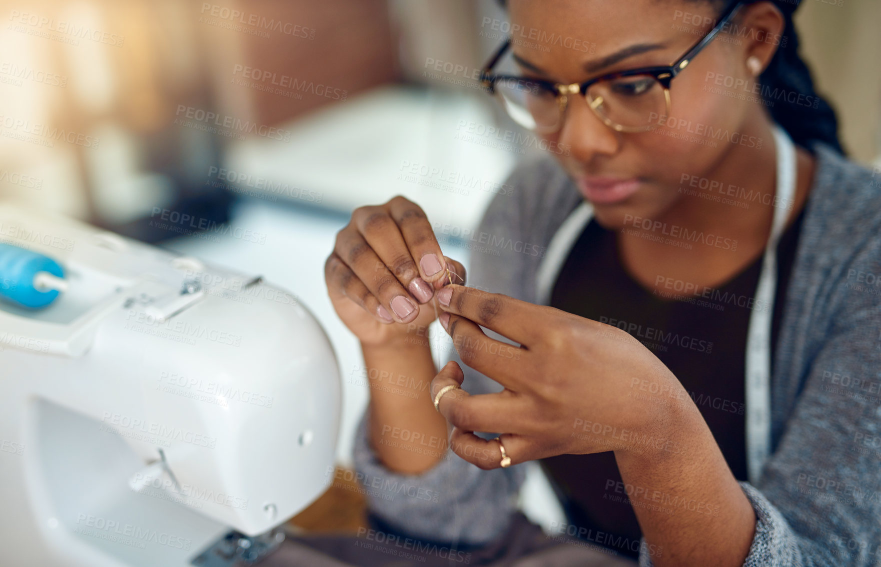 Buy stock photo Sewing, machine and black woman with tailor needle, designer and manufacturing work for boutique clothes. Fashion, fabric and creativity of seamstress with store, construction and textile at workshop