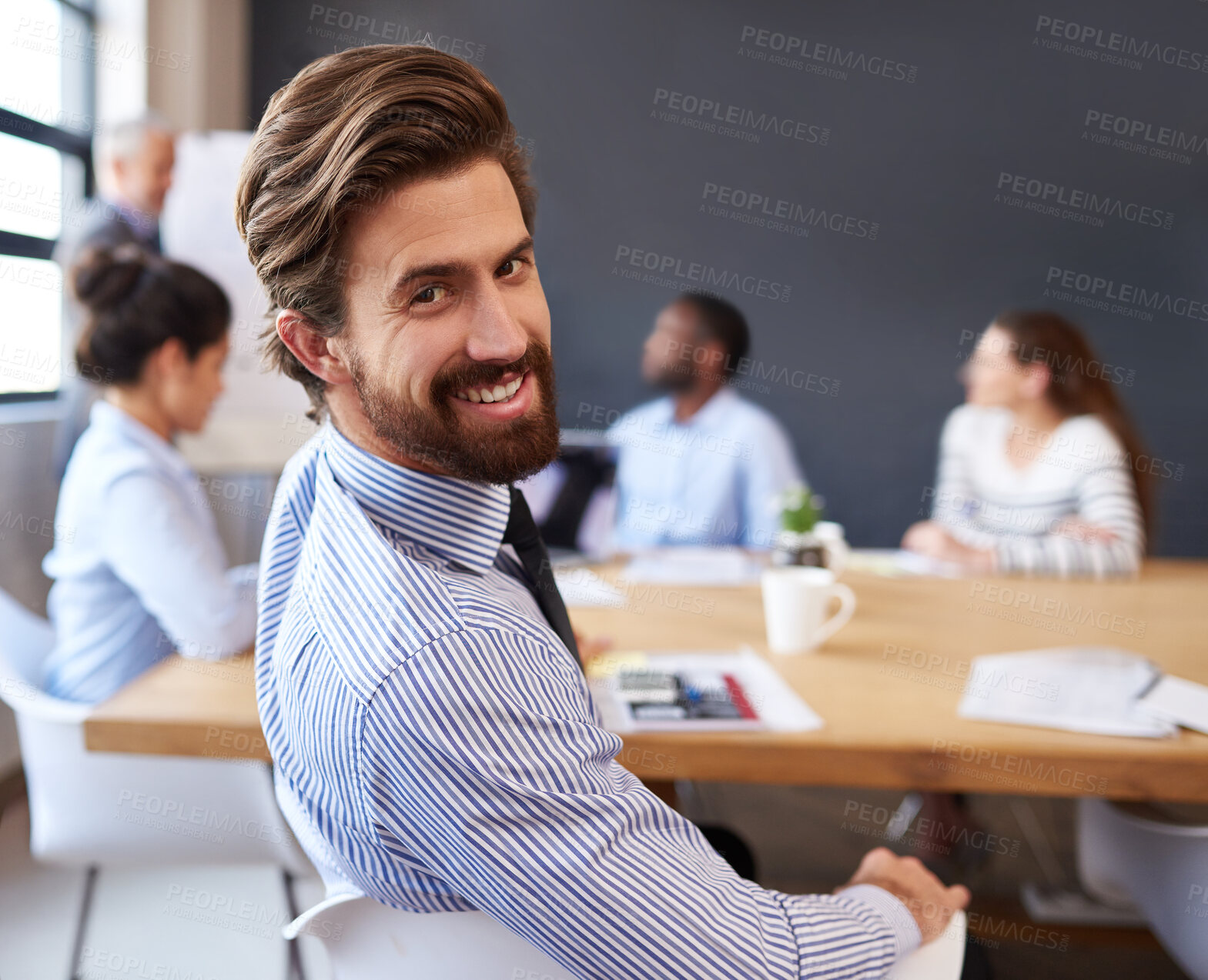 Buy stock photo Meeting, portrait and business man in office for staff training, workshop and creative agency. Boardroom, colleagues and male employee in presentation, startup project and planning in workplace
