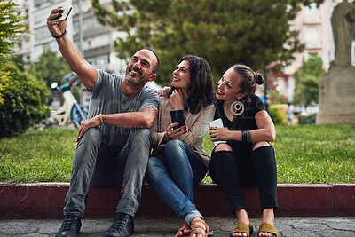 Buy stock photo Love, selfie and travel with couple of friends outdoor in city together for sightseeing or tourism. Happy, photograph and smile with group of people in urban town for adventure, holiday or vacation