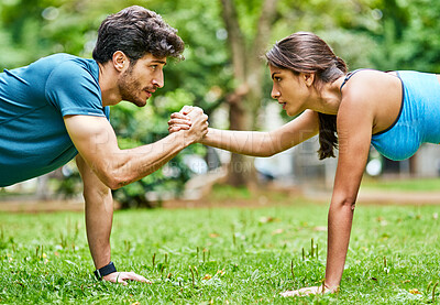 Buy stock photo Handshake, fitness and couple in park for push up, workout or exercise for support, teamwork or challenge. Accountability, bonding or athletes on grass for balance, training or muscle growth together