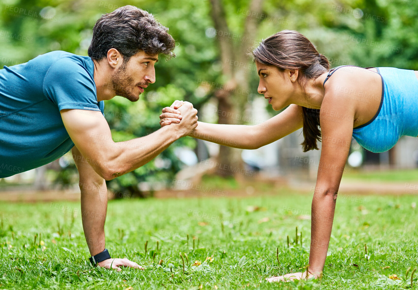 Buy stock photo Handshake, fitness and couple in park for push up, workout or exercise for support, teamwork or challenge. Accountability, bonding or athletes on grass for balance, training or muscle growth together