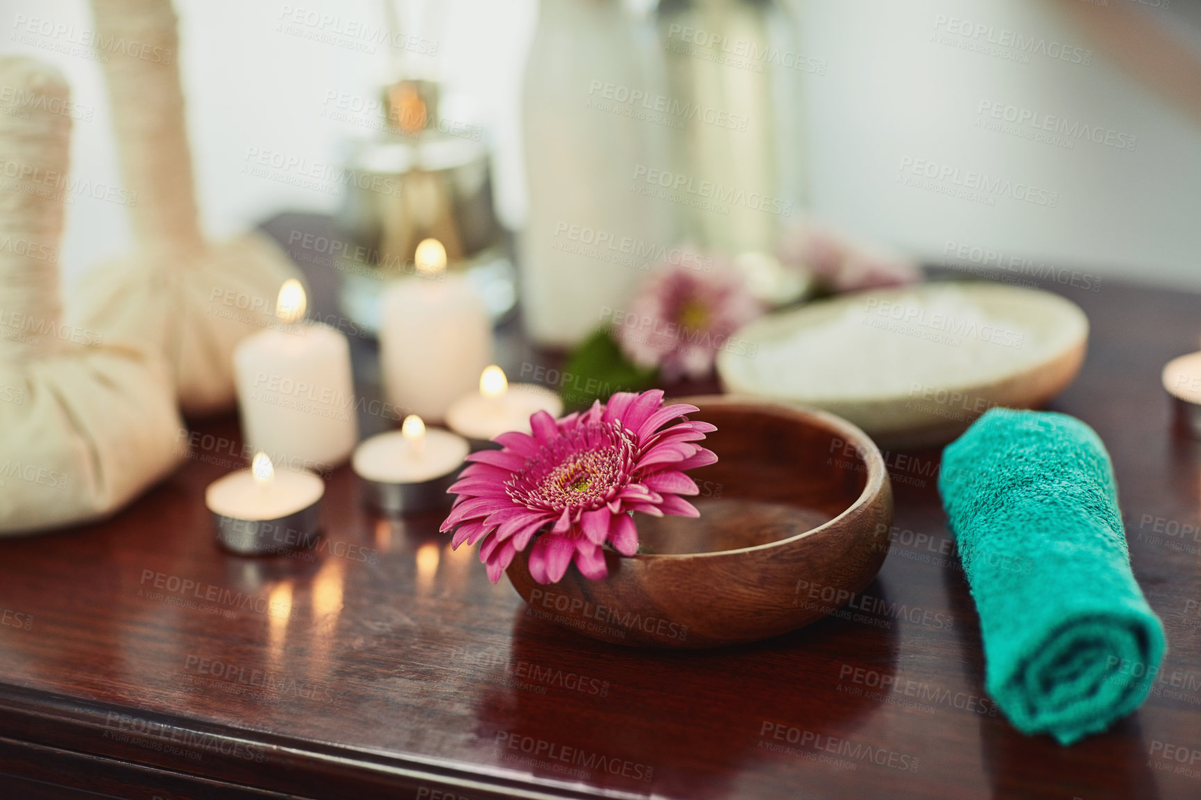 Buy stock photo Holistic, beauty and product with bowl in spa for salon, alternative treatment and balance. Detox, skincare and zen with candles and pinda massage therapy for luxury, wellness and aromatherapy