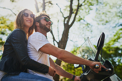 Buy stock photo Outdoor, couple and riding with scooter for travel, adventure and connection with happiness in nature. Relationship, man and woman with sunglasses on vacation, bonding or motorbike for transportation