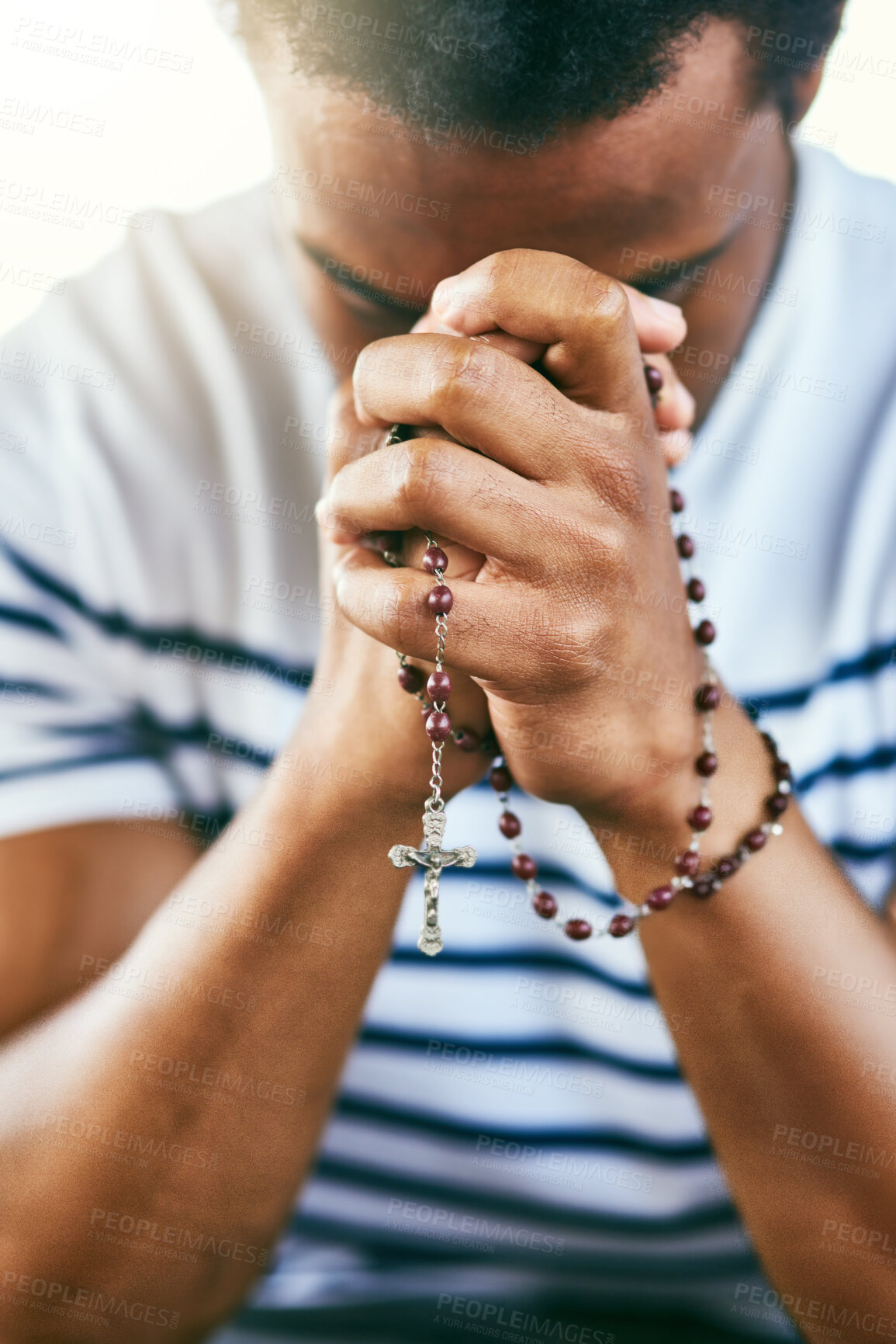 Buy stock photo Hands, rosary and praying man with faith, gratitude and connection with cross, necklace and religion. Person, Christian jewellery and spiritual meditation for forgiveness, peace or praise in morning