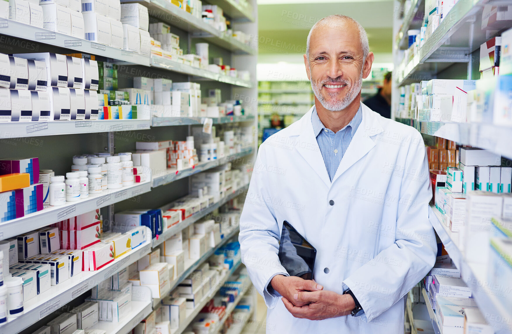 Buy stock photo Portrait, pharmacist and senior man with tablet in aisle, healthcare and confidence with occupation. Face, employees and medical with professional, tech and retail with stock, smile and inventory