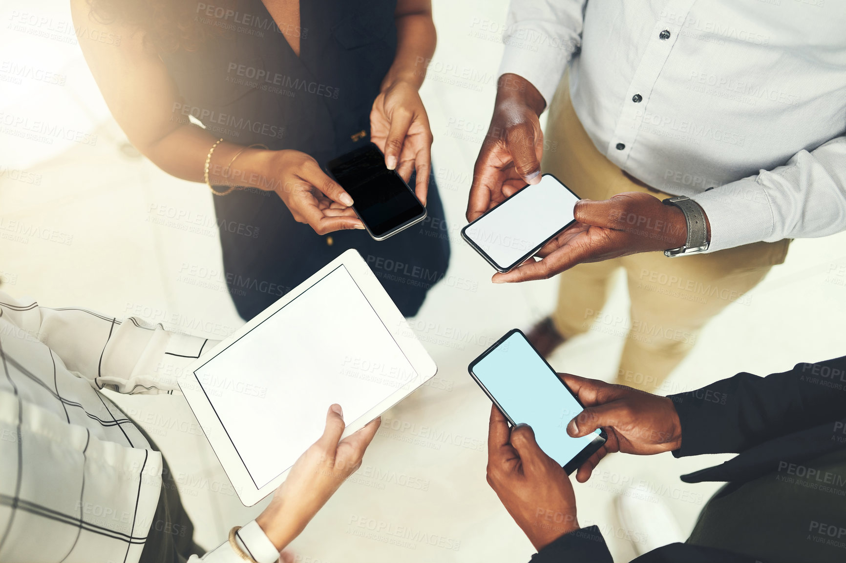 Buy stock photo Business people, hands and tech for circle in office, campaign project and research media trend. Employees, above and huddle for feedback on audience engagement, screen and mockup space at workplace