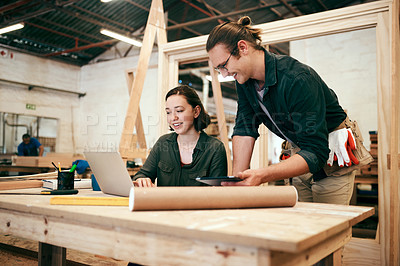 Buy stock photo Carpentry, discussion and people on laptop in workshop for timber, lumber and furniture business. Construction, woodworking and man and woman talk with tech for online inventory, teamwork or planning