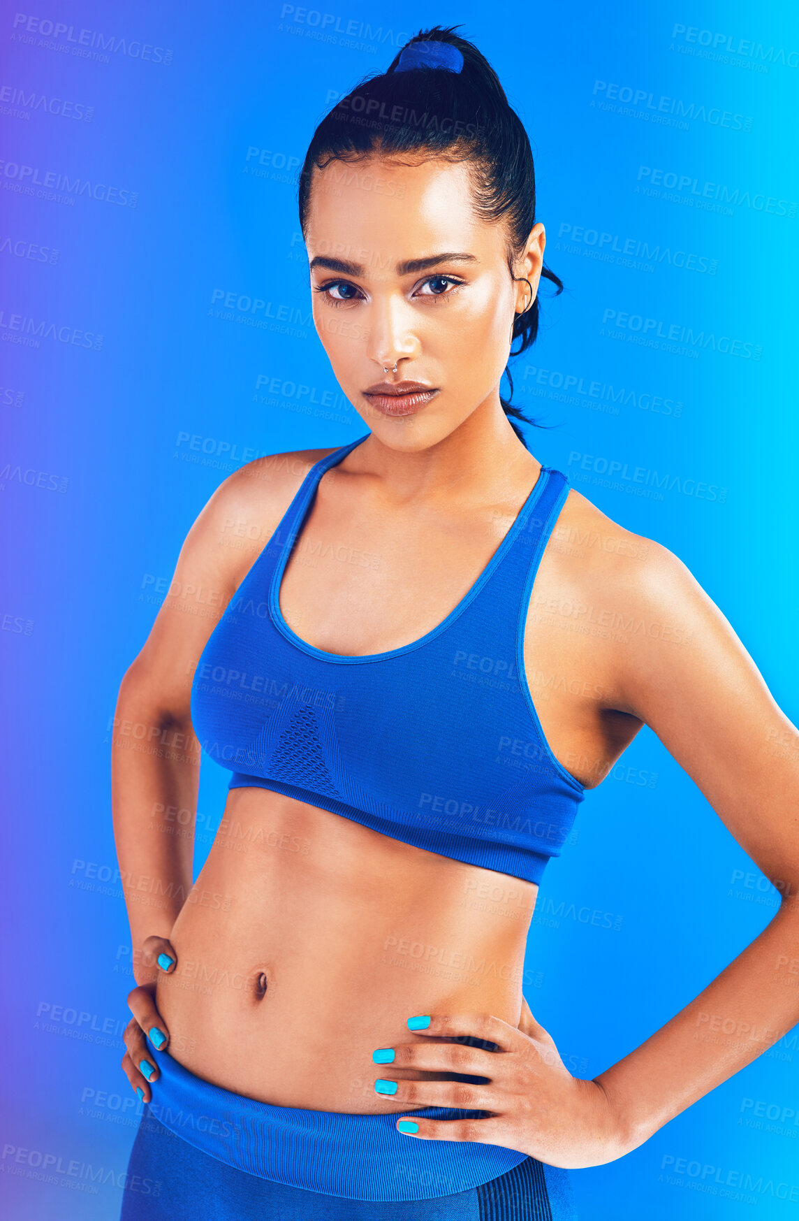 Buy stock photo Fitness, serious and portrait of woman on blue background for health, wellness and active in studio. Personal trainer, yoga instructor and isolated person for exercise, training and workout for gym