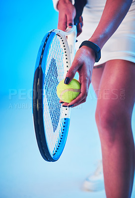 Buy stock photo Sports, tennis and hands of woman with racket on blue background for game, match and competition in studio. Challenge, fitness and person with ball for exercise, training and workout for tournament