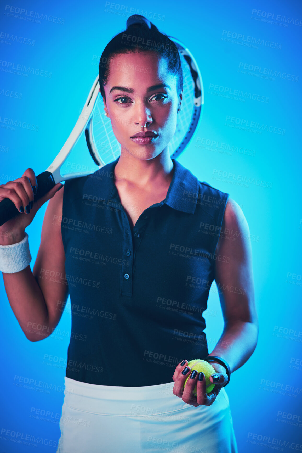 Buy stock photo Sports, tennis ball and portrait of woman on blue background for game, match and competition in studio. Challenge, fitness and person with racket for exercise, training and workout for tournament