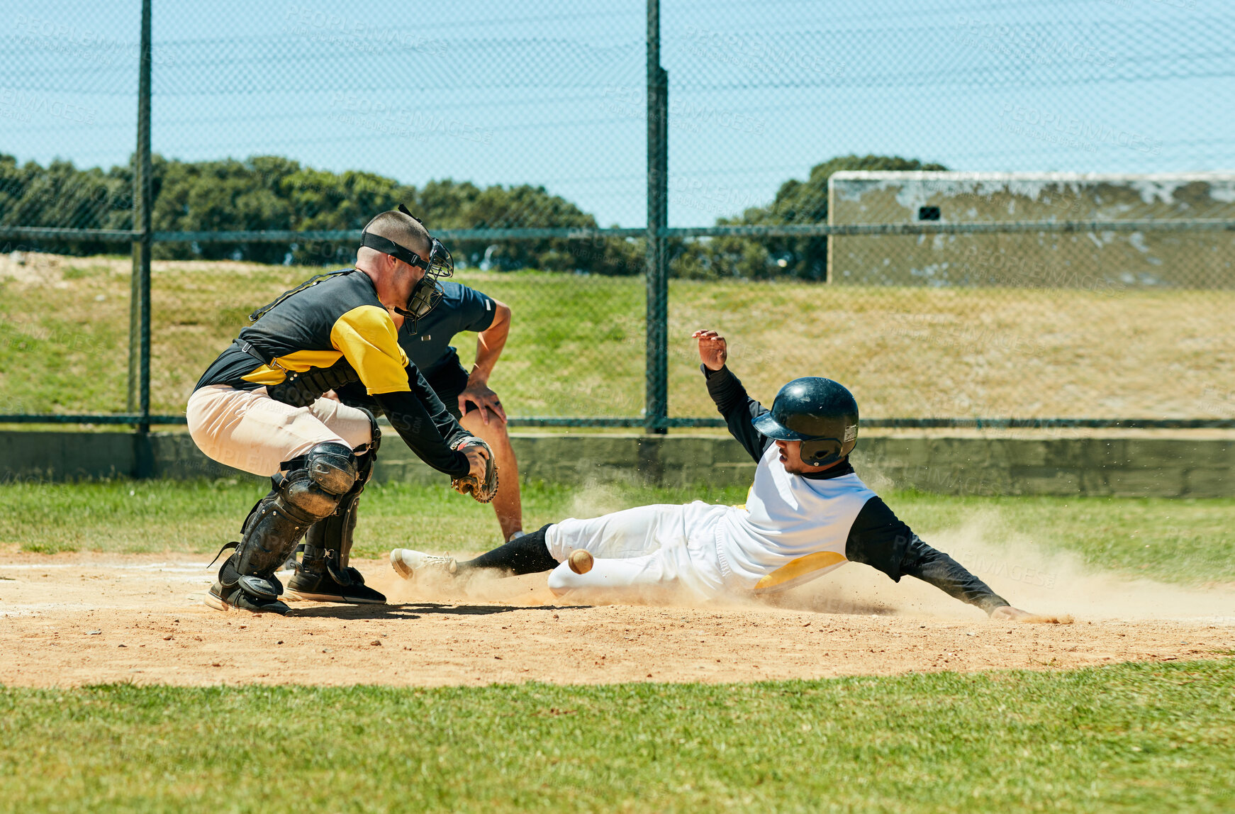 Buy stock photo Baseball, player and base with game, field and match with training, wellness and slide. Umpire, men and competition with practice, exercise and workout with fitness, victory and champion with sports
