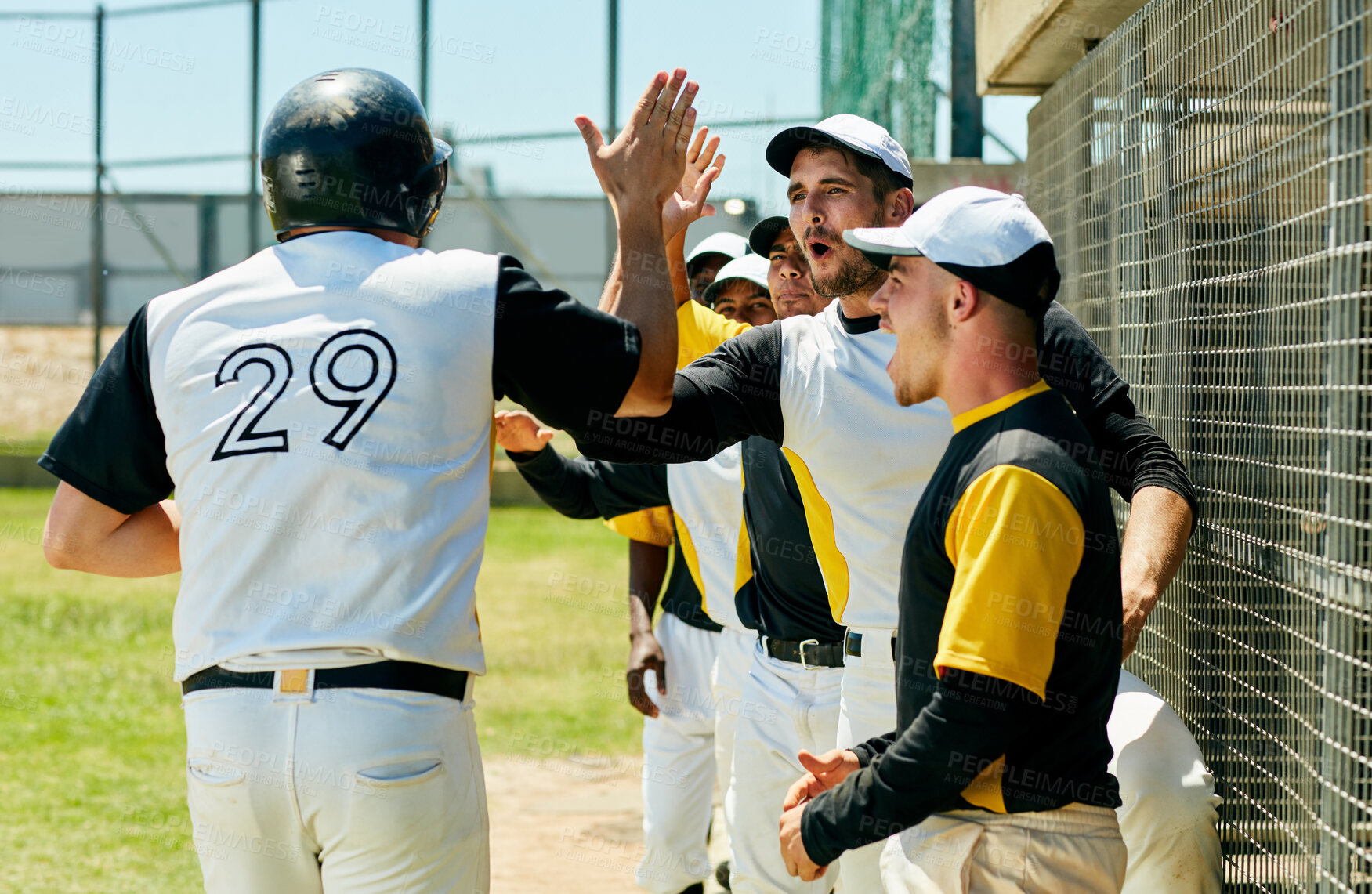 Buy stock photo Celebration, high five and baseball team at game on field cheering for team winning, score or achievement. Happy, sports and male athletes at stadium with energy for home run in outdoor match.