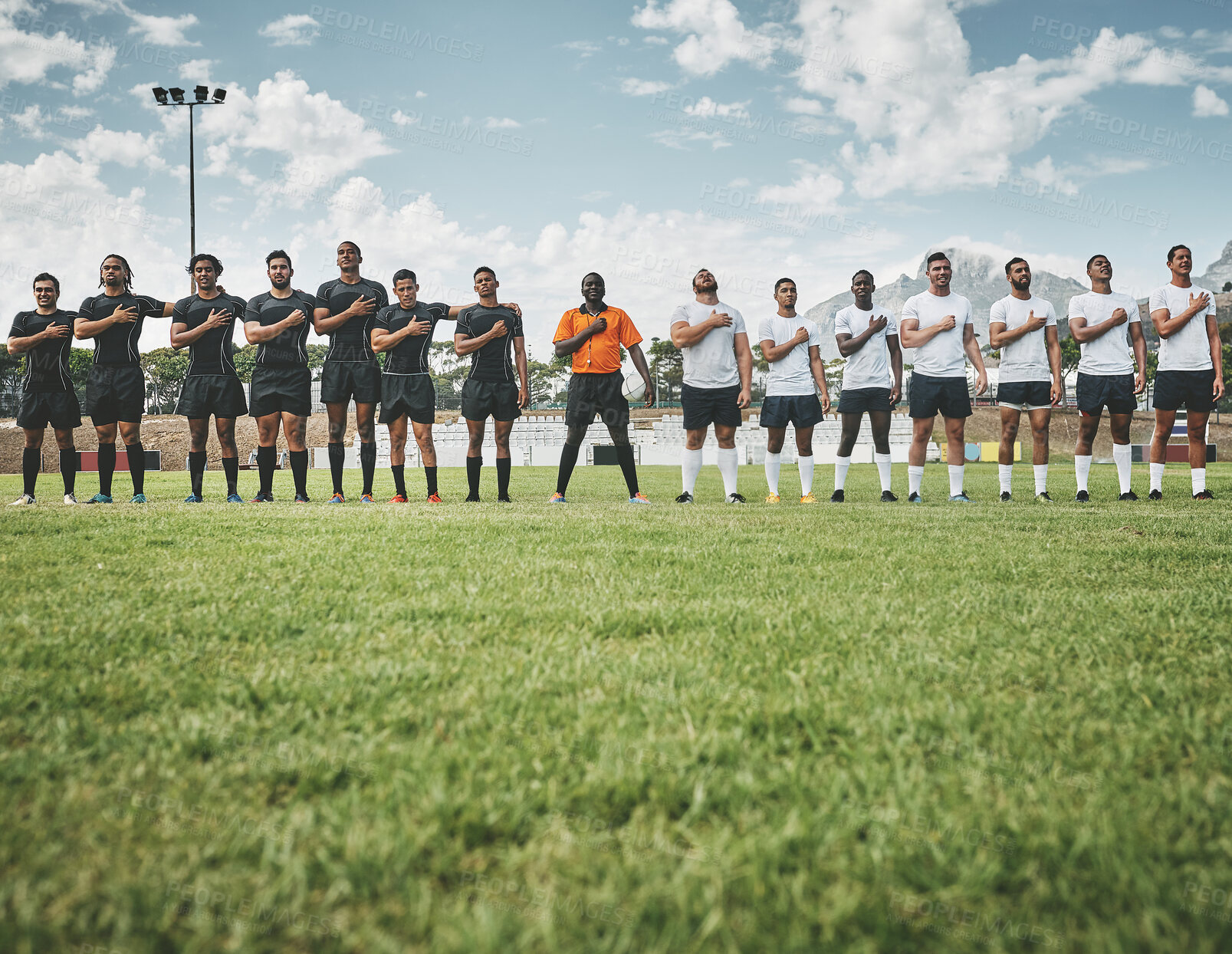 Buy stock photo Ceremony, rugby and anthem with men on field for stadium, community and premiership league. Patriotism, sports athlete and competition with people in training club for tournament, games and teamwork