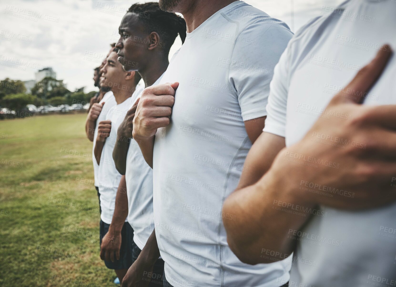 Buy stock photo Teamwork, rugby and anthem with men on field for stadium, community and premiership league. Patriotism, sports athlete and competition with people in training club for tournament, games and ceremony