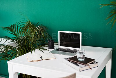 Buy stock photo Workspace, desk and notebook with laptop screen for creative design or journalism at modern office. Empty, table and computer display with books or mockup space for workstation, career startup or job