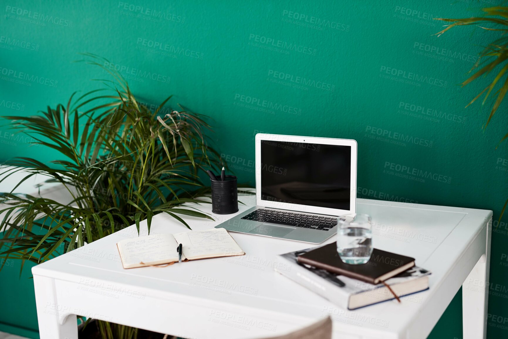 Buy stock photo Workspace, desk and notebook with laptop screen for creative design or journalism at modern office. Empty, table and computer display with books or mockup space for workstation, career startup or job