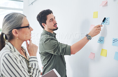 Buy stock photo Planning, idea and business people in office meeting for brainstorming, discussion and task agenda. Creative company, startup and man and woman with sticky notes for teamwork, research and project