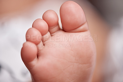 Buy stock photo Nursery, bed and feet of baby in home for relax, resting and calm for sleeping or wake up in morning. Family, youth and closeup of newborn toes in bedroom for child development, cute and adorable