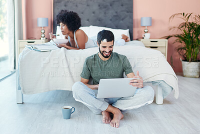 Buy stock photo Couple, man and laptop on floor in home for checking email, morning routine and scrolling on social media. Interracial people, wake up and technology in bedroom for reading news and search internet