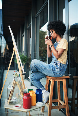 Buy stock photo Art, painting and tea with woman on balcony of home for creativity, expression or inspiration outdoor. Break, drink or relax and painter person at apartment for hobby or wellness with canvas on easel