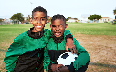 Buy stock photo Happy boys, portrait and hug with soccer ball for sports, match or team game together on grass field. Young male person, athlete or football players with smile for youth or childhood development