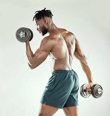 Buy stock photo Exercise, strong and black man with dumbbells, workout goal and healthy guy on a white studio background. Male person, model or bodybuilder with gym equipment, strength and power with muscle and body