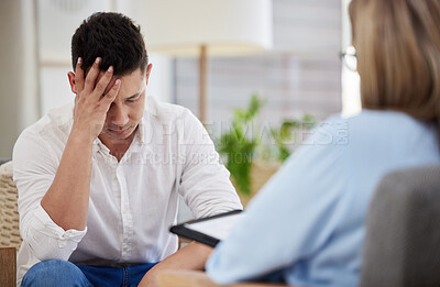 Buy stock photo Man, depression and therapy in clinic for counseling, communication or mental health with psychologist. Male person, anxiety and stress in office for psychology, conversation or trauma rehabilitation