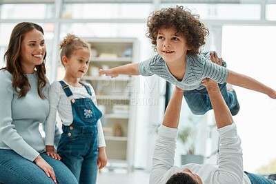 Buy stock photo Home, parents and children with airplane for playful, connection and bonding together with game. Family, mother and father with kids for childhood fantasy, entertainment and papa with boy for flying