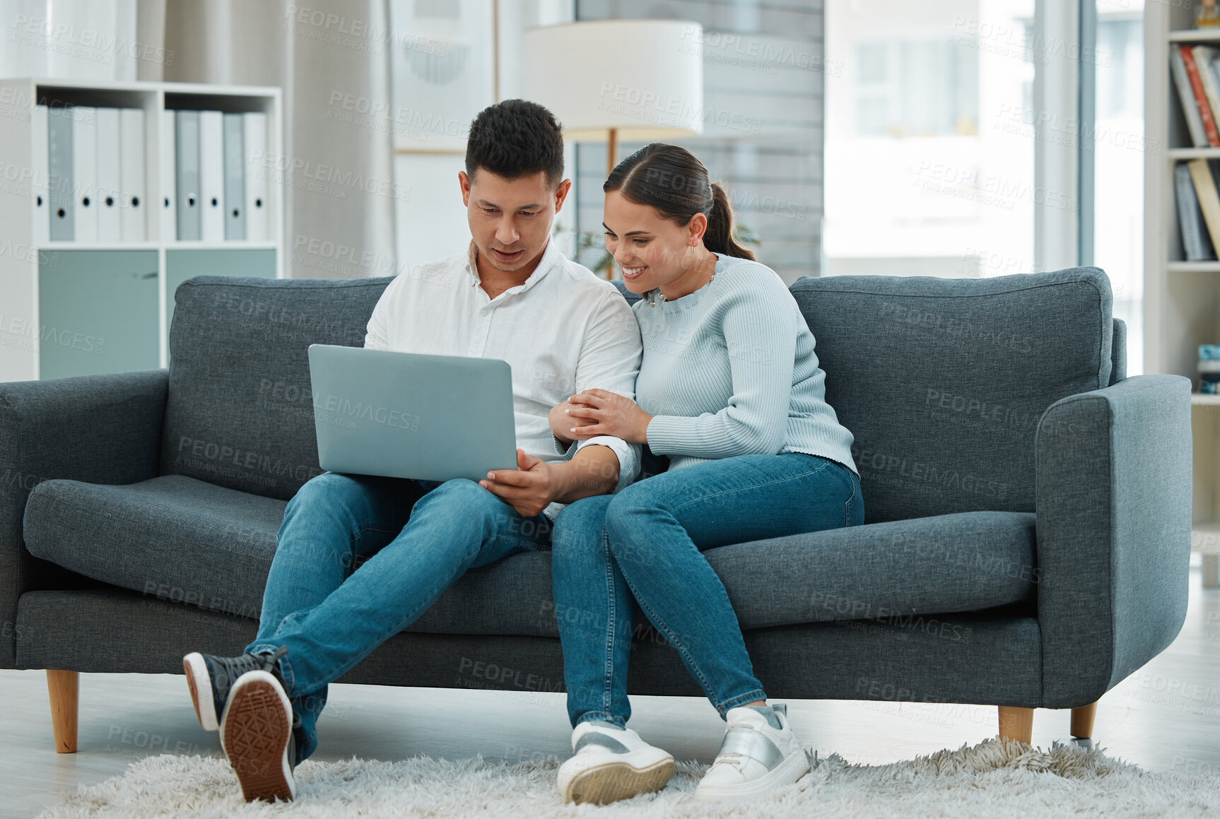 Buy stock photo Happy, laptop and couple with living room, sofa and relax in house or apartment for date. Smile, love and man with woman with funny video, meme or internet for online streaming or movie at home