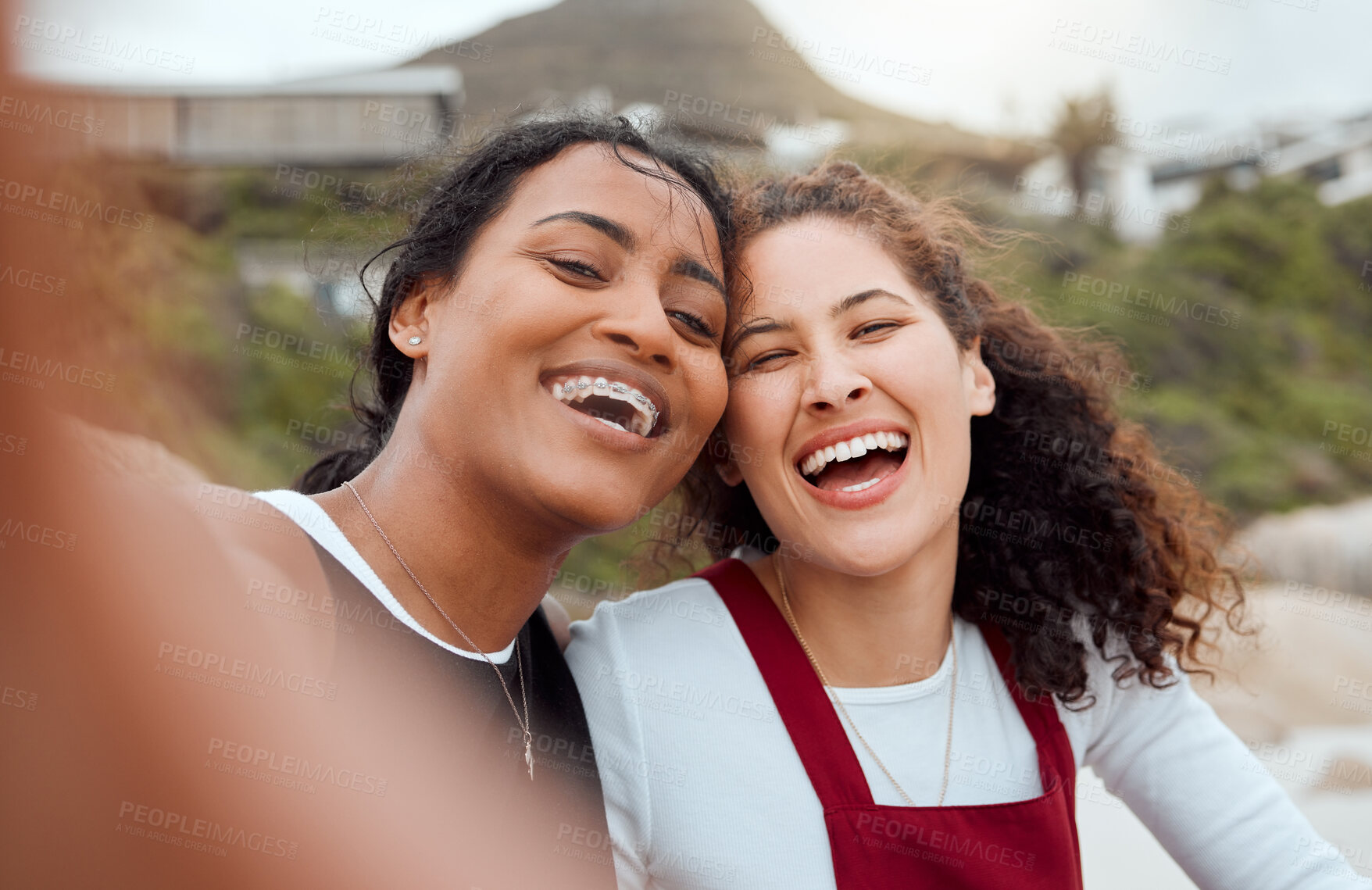 Buy stock photo Happy, lesbian and selfie of couple at beach for bonding, relax together and relationship by ocean. Lgbtq dating, travel and portrait of women with smile for holiday, vacation and weekend in nature