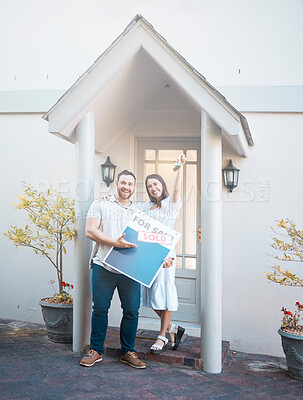 Buy stock photo Portrait, keys and happy couple with sign for real estate, sale and investment loan. New home, man and woman with sold property, mortgage and celebrate moving to dream house for relocation outdoor