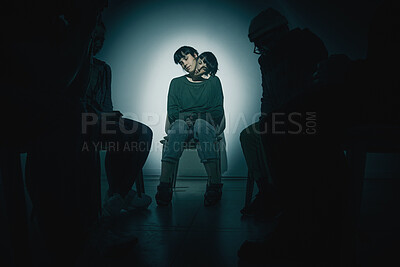 Buy stock photo Mental health, psychology and shadow with woman in studio on dark background for rehabilitation. Bipolar, fear and schizophrenia with patient person in spotlight for healthcare or medical assessment