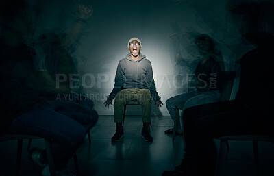 Buy stock photo Mental health, screaming and shadow with man in studio on dark background for rehabilitation. Bipolar, fear and psychology with patient yelling in spotlight for healthcare or medical assessment