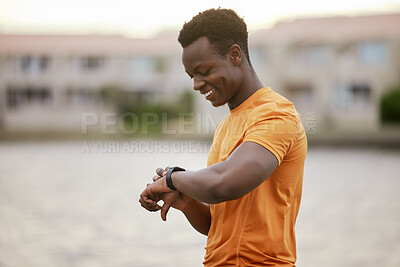 Buy stock photo Outdoor, fitness and black man checking time for morning training, wellness and challenge at park. Health, smile and happy athlete with smart watch for workout schedule, tracking app or exercise plan