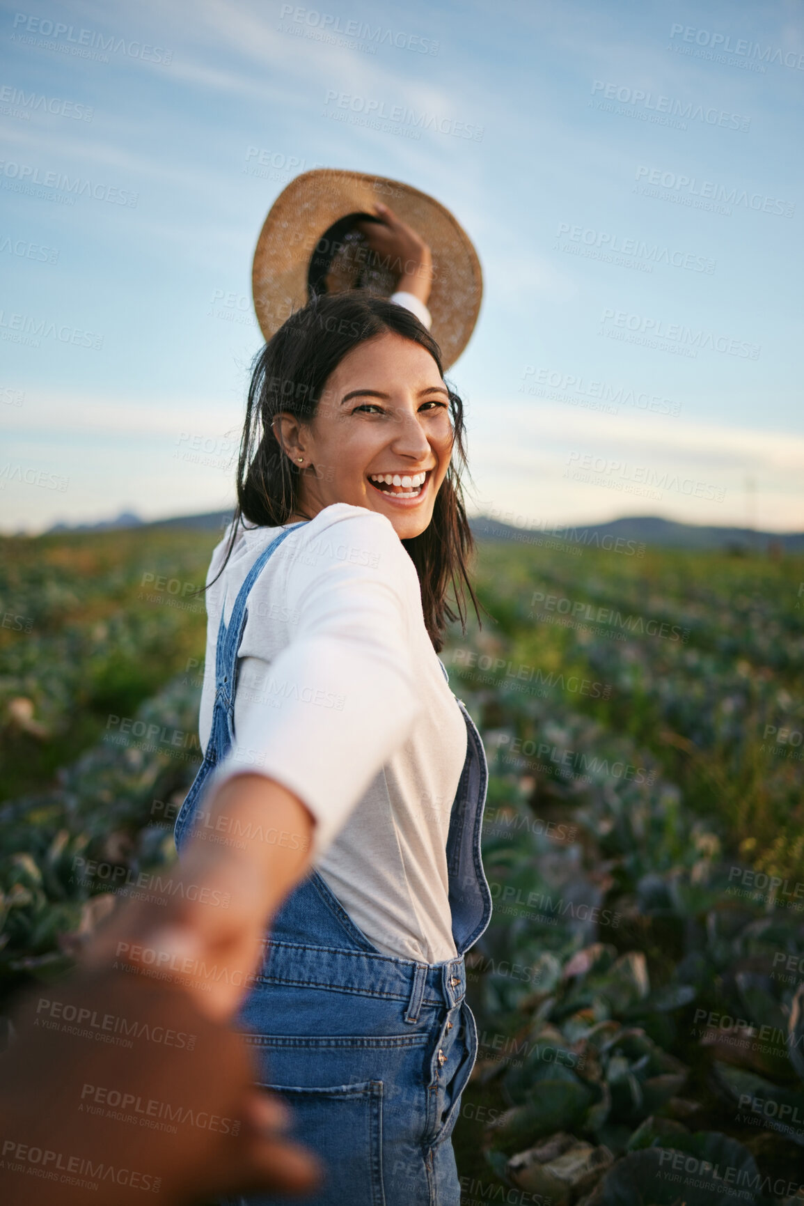 Buy stock photo Holding hands, couple and portrait of woman on farm for holiday, vacation and adventure in countryside. Happy, nature and person walking in vegetable field, environment and outdoors for agriculture