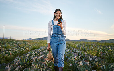 Buy stock photo Farmer, smartphone and woman in nature, smile and growth of crops, planning and business of cabbage. Environment, thinking and person in countryside, typing and entrepreneur with vegetables or mobile