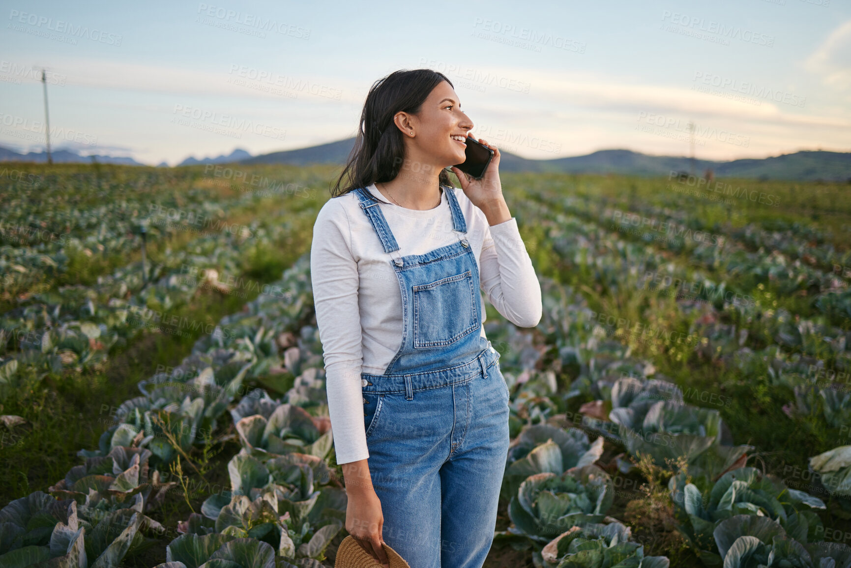 Buy stock photo Farmer, phone call and woman in nature, smile and growth of crops, planning or business of cabbage. Environment, thinking and person in countryside, talking and entrepreneur with vegetables or mobile