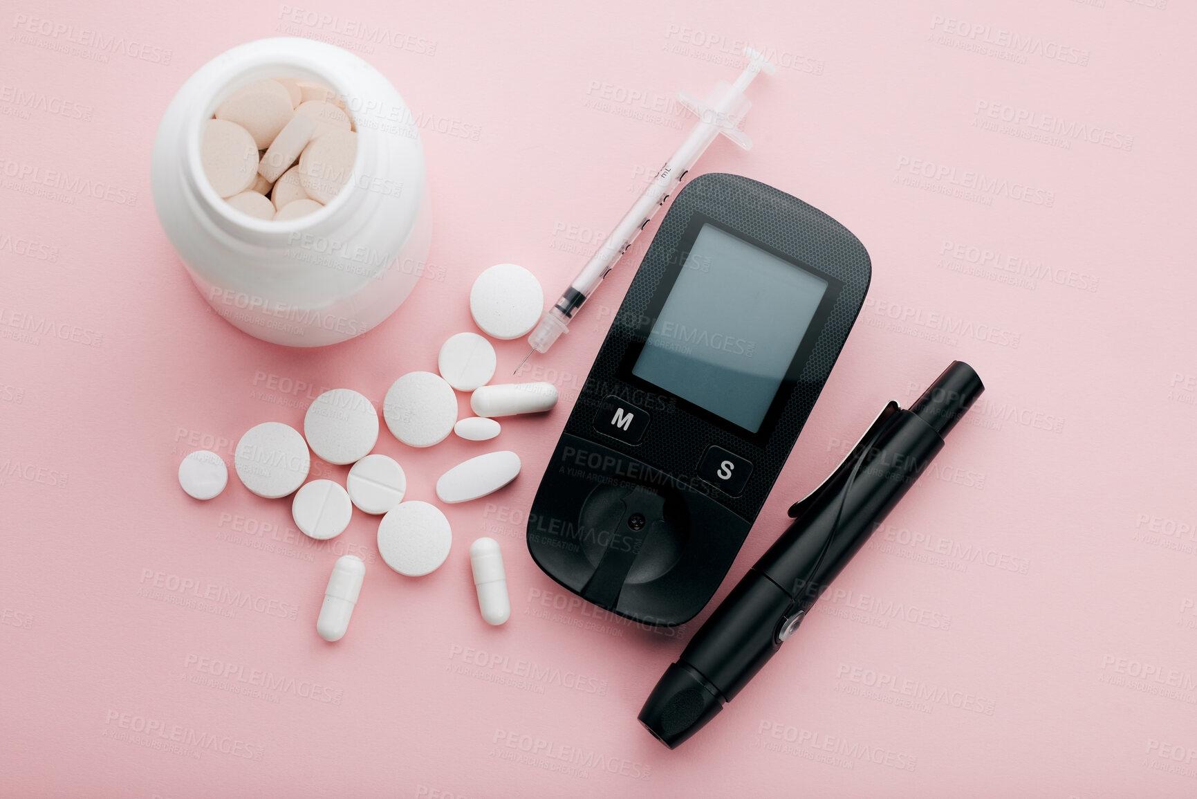 Buy stock photo Glucometer, pills and healthcare in studio, medical and equipment for sugar level, screen and injection. Treatment, medicine and tech for diabetes, monitor and tracking of blood and pink background