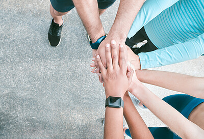 Buy stock photo Fitness, group and hands together on road with exercise, motivation and support. Runner, team and people with marathon training, diversity and community of urban running club or friends above