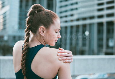 Buy stock photo Girl, shoulder pain and sports injury with exercise, fitness and performance for strong muscle. Female person, workout and emergency for massage as joint strain or inflammation as athlete in city