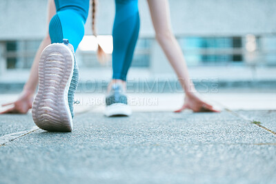 Buy stock photo Back, person and shoes in city for fitness, training and start of race for exercise. Woman, runner and sneakers on asphalt for challenge, wellness and leg muscle development with cardio for growth