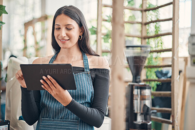 Buy stock photo Waitress, coffee shop and tablet for customer service, beverage or small business in bistro. Female person, hospitality and technology as barista, entrepreneur or employee in cafe as restaurant staff