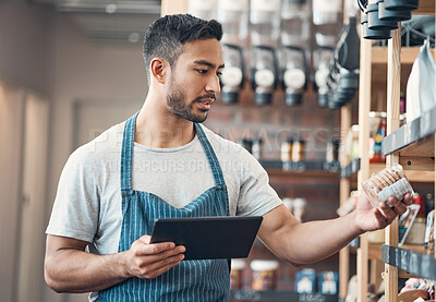 Buy stock photo Small business, man and check in cafe with tablet, product inspection and inventory management. Coffee shop, male manager and barista with digital for stock quality, startup order and online services