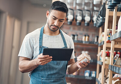 Buy stock photo Man, waiter and coffee shop with tablet, inventory and quality control for small business or bistro. Male person, technology and stock management as barista, entrepreneur and employee in restaurant