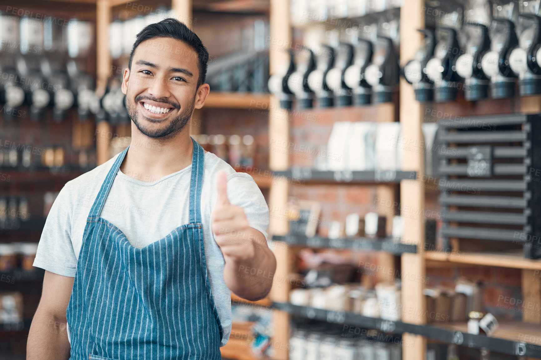 Buy stock photo Cafe, business owner and asian man in portrait with thumbs up, achievement and success for customer service. Coffee shop, male person and barista with hand sign for good job, feedback and hospitality