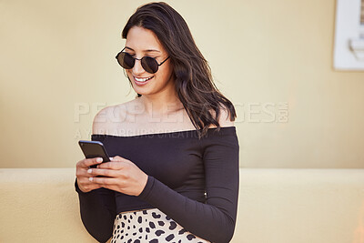 Buy stock photo Woman, sunglasses and travel with phone in city for outdoor adventure, communication and holiday update. Smile, happy and female person with technology by buildings for social media, post or vacation