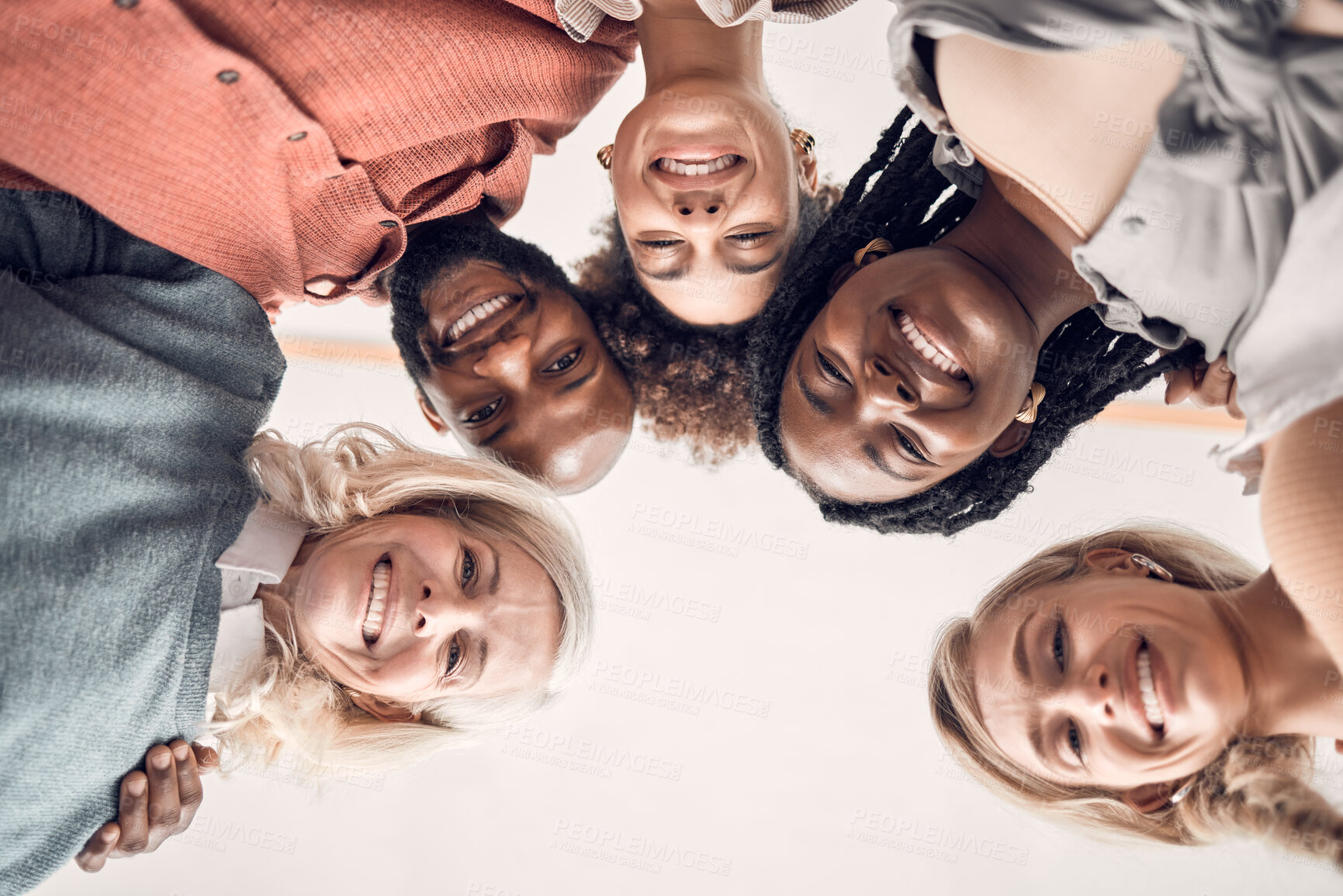 Buy stock photo Business people, portrait and circle in office with low angle, teamwork and diversity with hug for synergy. Women, man and group in scrum, huddle and connection with solidarity at creative agency